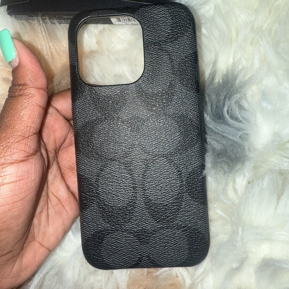 Black iPhone 15 pro coach case